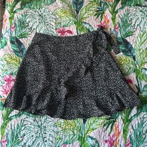 Black and White Mini Wrap Skirt with Ruffled Tie Front for Casual Nights